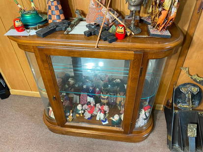 Vintage Small Curved Glass Display or Curio Cabinet.: Vintage Small Curved Glass Display or Curio Cabinet. 29" high x 30" wide x 10" deep. Our in house shipping is not available. Pickup is Sunday July 24th from 10 am to 5 pm in Marietta, Ohio and Monday