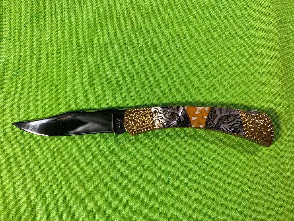 BUCK 110 Custom Designed by Michael Prater Painted Pony #7 Folding Knife: BUCK 110 Custom Designed by Michael Prater Painted Pony #7 Folding Knife. In-house shipping available. Pickup is Monday, March 13th from 11am to 6pm in Carroll, Ohio 43112 or we will provide in-house