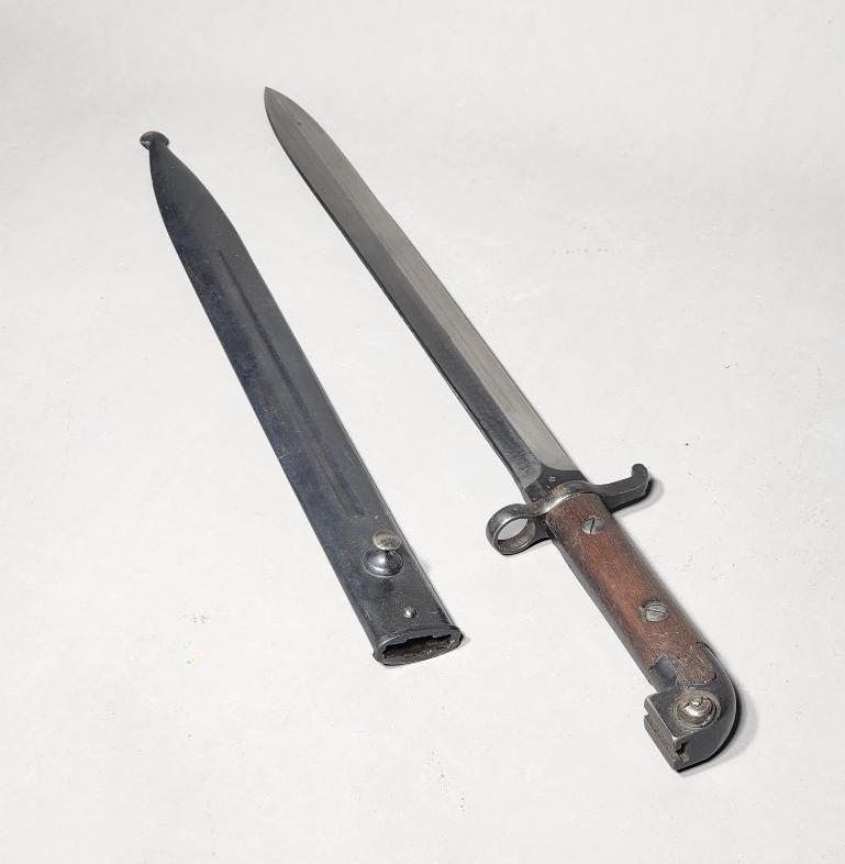 Swedish M1914 bayonet with scabbard: 18" overall. SHIPPING: In-house shipping available. Pickup is Monday, June 5 from 2 pm to 7 pm and Tuesday, June 6 from Noon to 5 pm in Carroll, Ohio 43112 or we will provide in-house shipping for thi