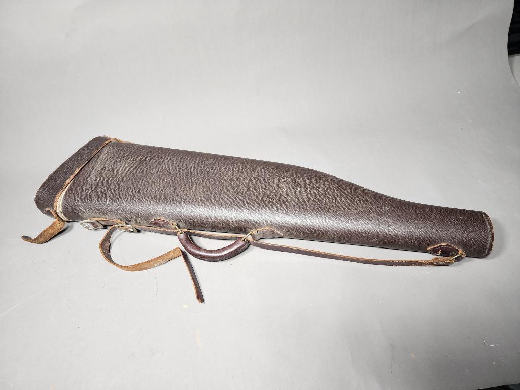 Unusual Hunting or Military Shotgun Leather Case: Redhead brand. 31" long. SHIPPING: In-house shipping available. Pickup is Monday, June 5 from 2 pm to 7 pm and Tuesday, June 6 from Noon to 5 pm in Carroll, Ohio 43112 or we will provide in-house ship