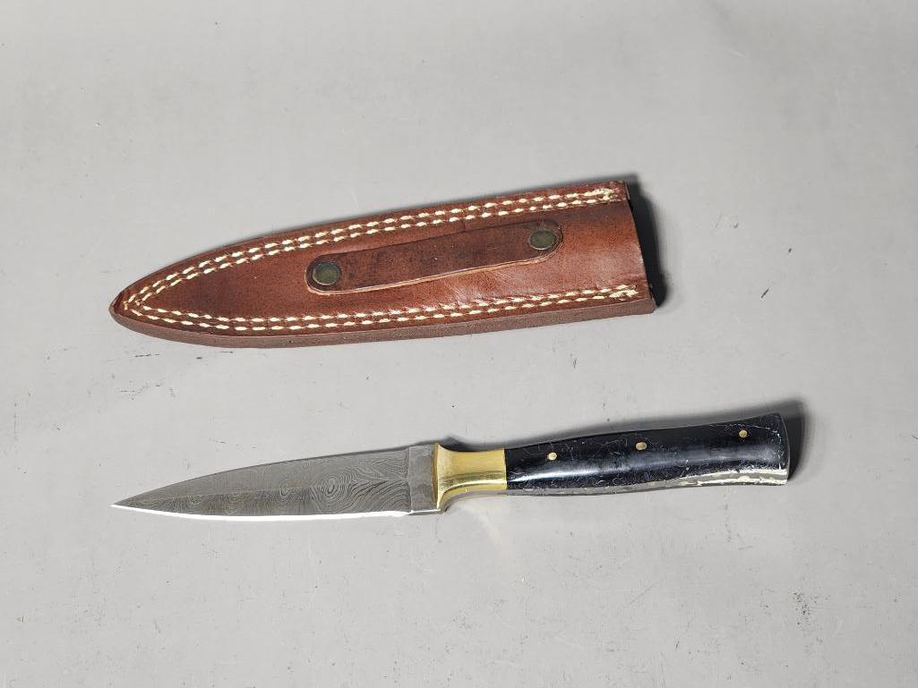 Damascus Knife In Sheath - Double Sided Blade: SHIPPING: In-house shipping available. Pickup is Monday, June 5 from 2 pm to 7 pm and Tuesday, June 6 from Noon to 5 pm in Carroll, Ohio 43112 or we will provide in-house shipping for this item. Sales