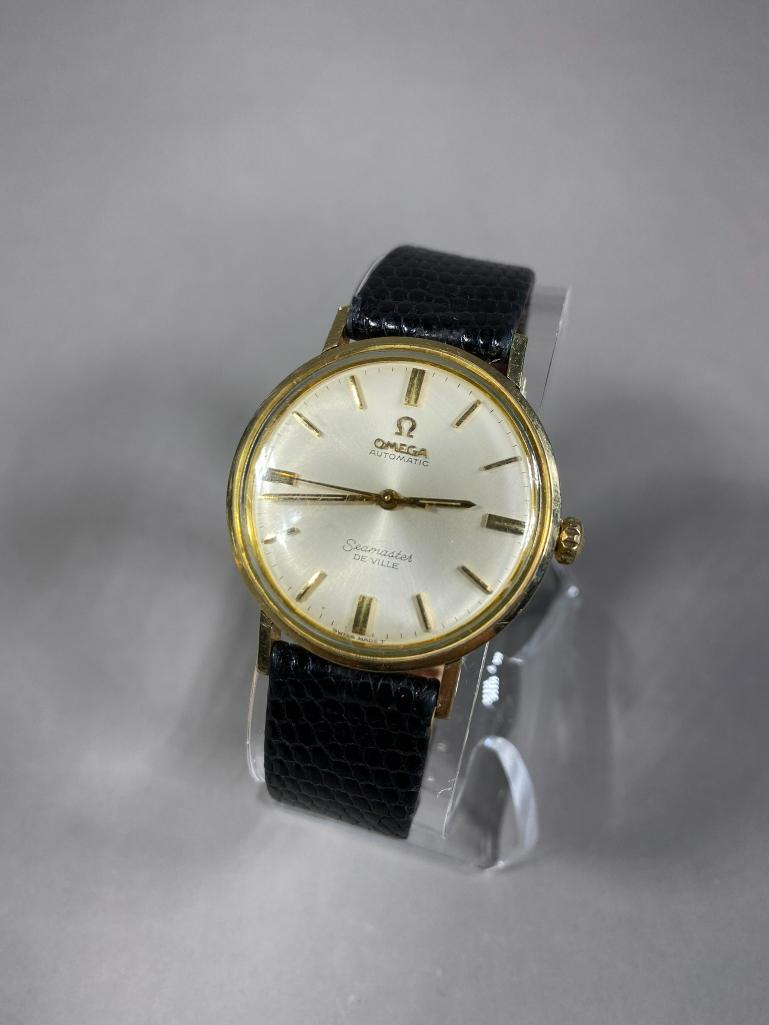 Omega Seamaster Deville Men's Watch Gold Plated: Runs. 33 mm case size not including crown. The crown is correct. In-house shipping available. Pickup is Monday, July 31st from 11am to 4pm in Carroll, Ohio 43112 or we will provide in-house shipping f