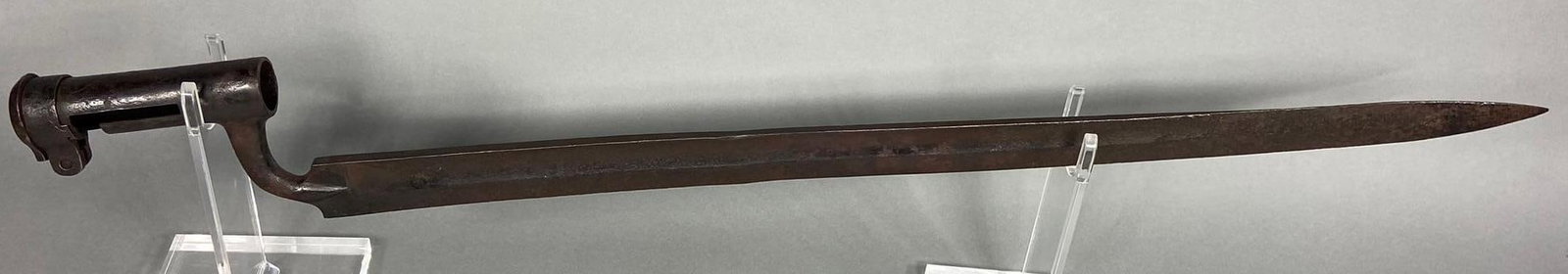 REVOLUTIONARY WAR -WAR OF 1812 BAYONET FLAT BLADE: c1770s -1790s large caliber flat blade bayonet. Appears to be British. The interior socket opening is 15/16" in diameter. Overall length is 27&7/8" with a 23" blade. Good condition with some minor pit