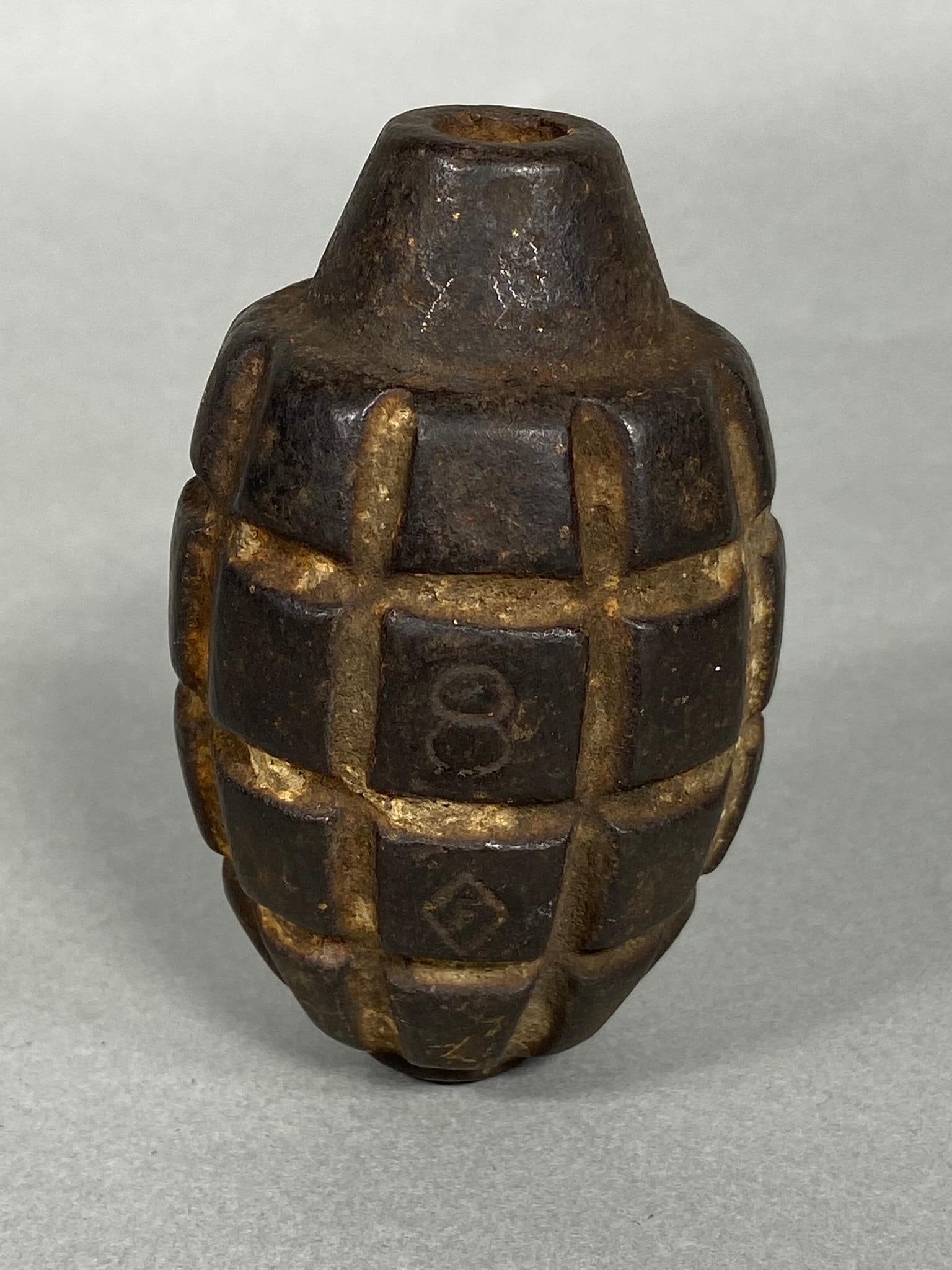 WWI UNITED STATES MK 1 HAND GRENADE BODY - INERT: World War One United States MK 1 grenade body. The manufacturer's code, number 8 over a diamond, is stamped into the body of the grenade. Inert. In-house shipping is available. Pickup is Thursday, Oct