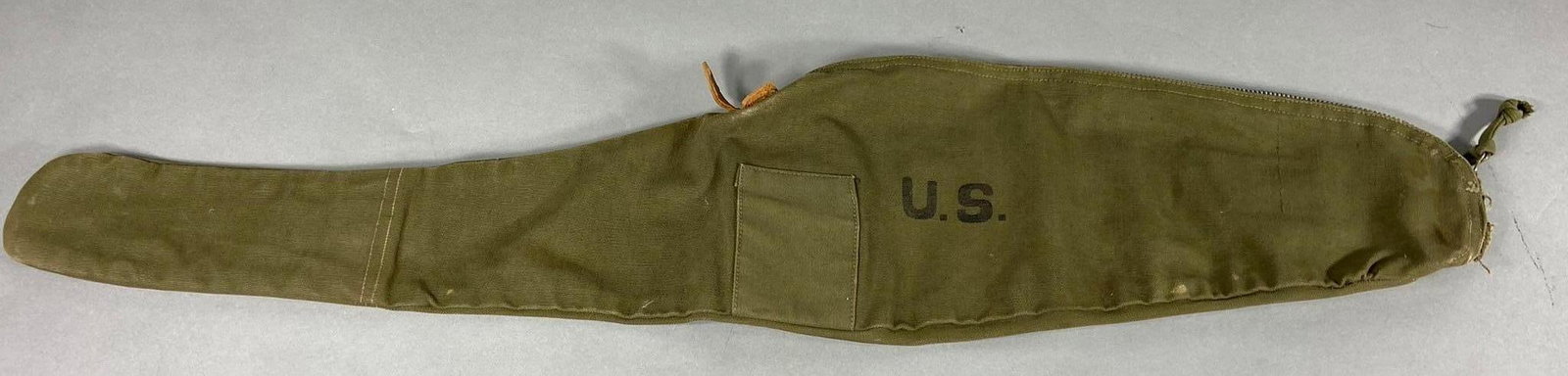 WWII US M1 CARBINE CANVAS CARRYING CASE: World War Two M1 Carbine canvas carrying case. Stamped on the inside of the case is "M. D. Mfg. Co. 1945". Zipper works well. Case appears to be unused but there is a 1" edge tear. In-house shipping i