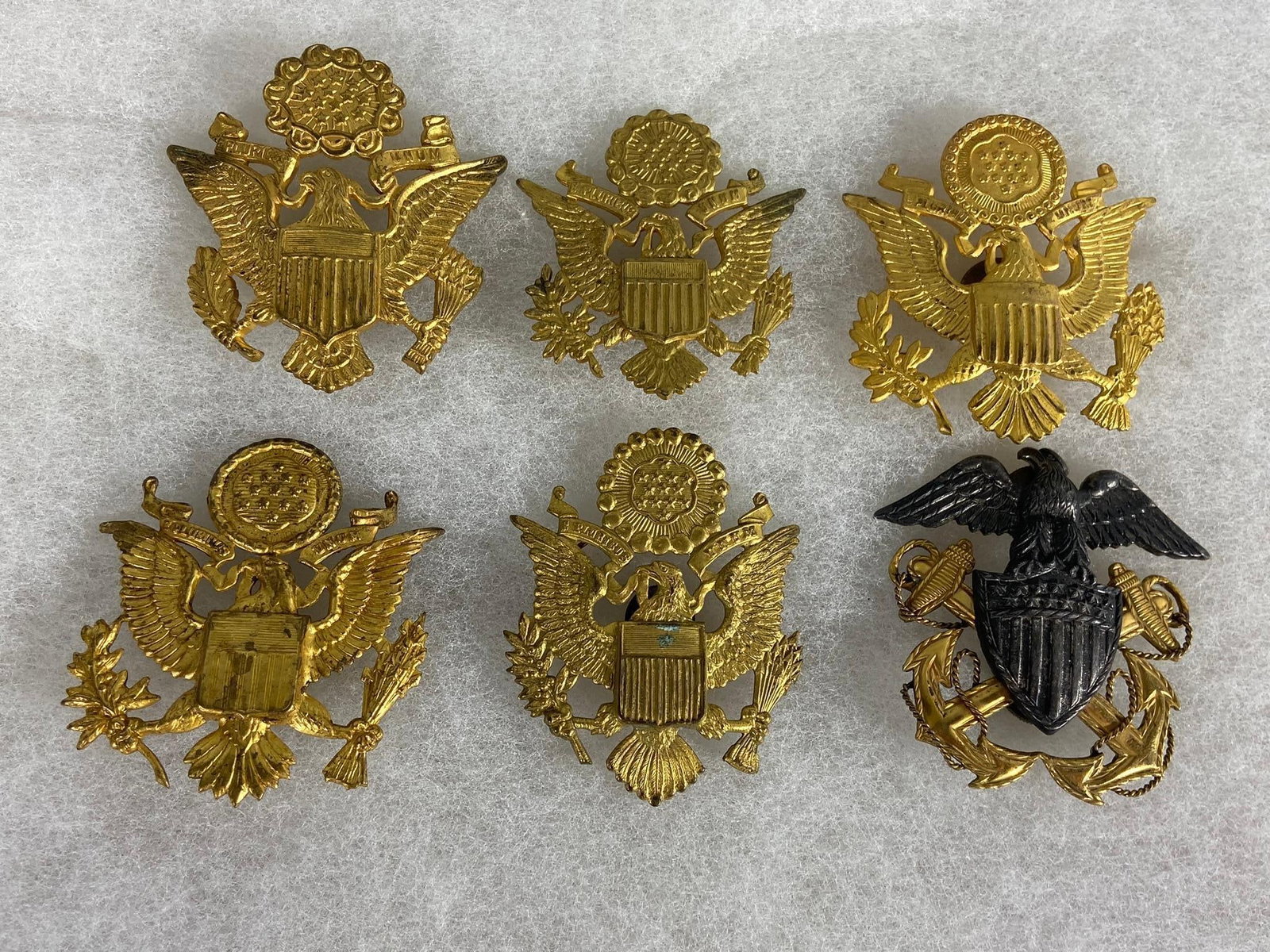 WWII U.S. ARMY & NAVY OFFICER HAT EAGLE LOT: World War Two United States Army & Navy officer Hat insignia. Three have stampings; "Amcraft acid test" . "Meyer," and "Acid test". In-house shipping is available. Pickup is Thursday, Oct. 19 and Frid