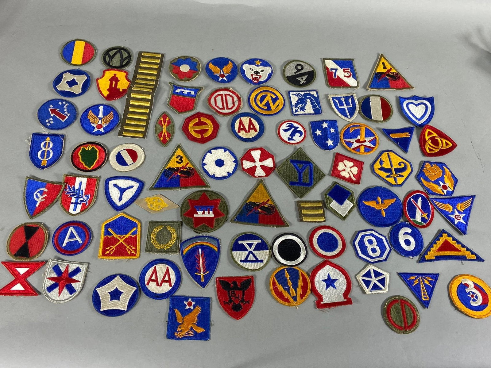 WWII US PATCH LOT AIR FORCE ARMY ARMORED: World War Two patch lot of 72 cut edge patches including, Army, Corps, Division, Army Air Force, Armored, etc. In-house shipping is available. Pickup is Thursday, Oct. 19 and Friday Oct. 20 from 10 am
