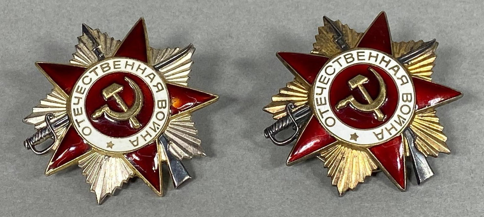 RUSSIAN MEDALS ORDER OF THE GREAT PATRIOTIC WAR: World War Two Order of the Patriotic War medal lot including a 1st class medal serial numbers 1029556 and a 2nd class medal serial numbered 1898913. These two medals are in the serial number range ind