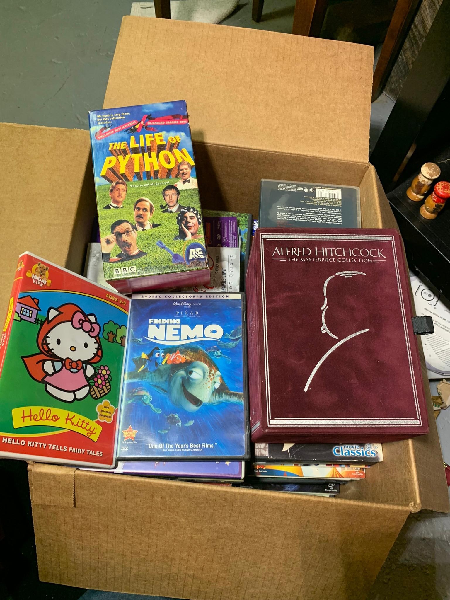 Group of DVDs and VHS Tapes: Group of DVDs and VHS Tapes. Our in-house shipping is available. Pickup is Thursday, November 2nd from 10am to 4pm in Cincinnati, Ohio 45230. (THIS IS THE ONLY PICKUP WINDOW) or we will provide in-hou