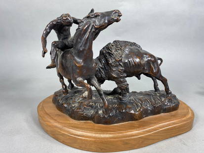 After C.M. Russell Bronze Sculpture Native American on Horse with Buffalo.: After C.M. Russell Bronze Sculpture Native American on Horse with Buffalo. Signed CM Russell in the casting. Sculpture itself is 13" long. Base is 16" long. From an area estate. In-house shipping is