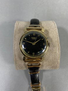 Vintage Vulcain Cricket Alarm Watch Allan Adler 10k gold band.: Vintage Vulcain Cricket Alarm Watch with rare Allan Adler 10k gold band. Runs and works but is missing a button. Watch band has 10k gold trim pieces, watch case itself is 10k gold filled. Case is 33 m