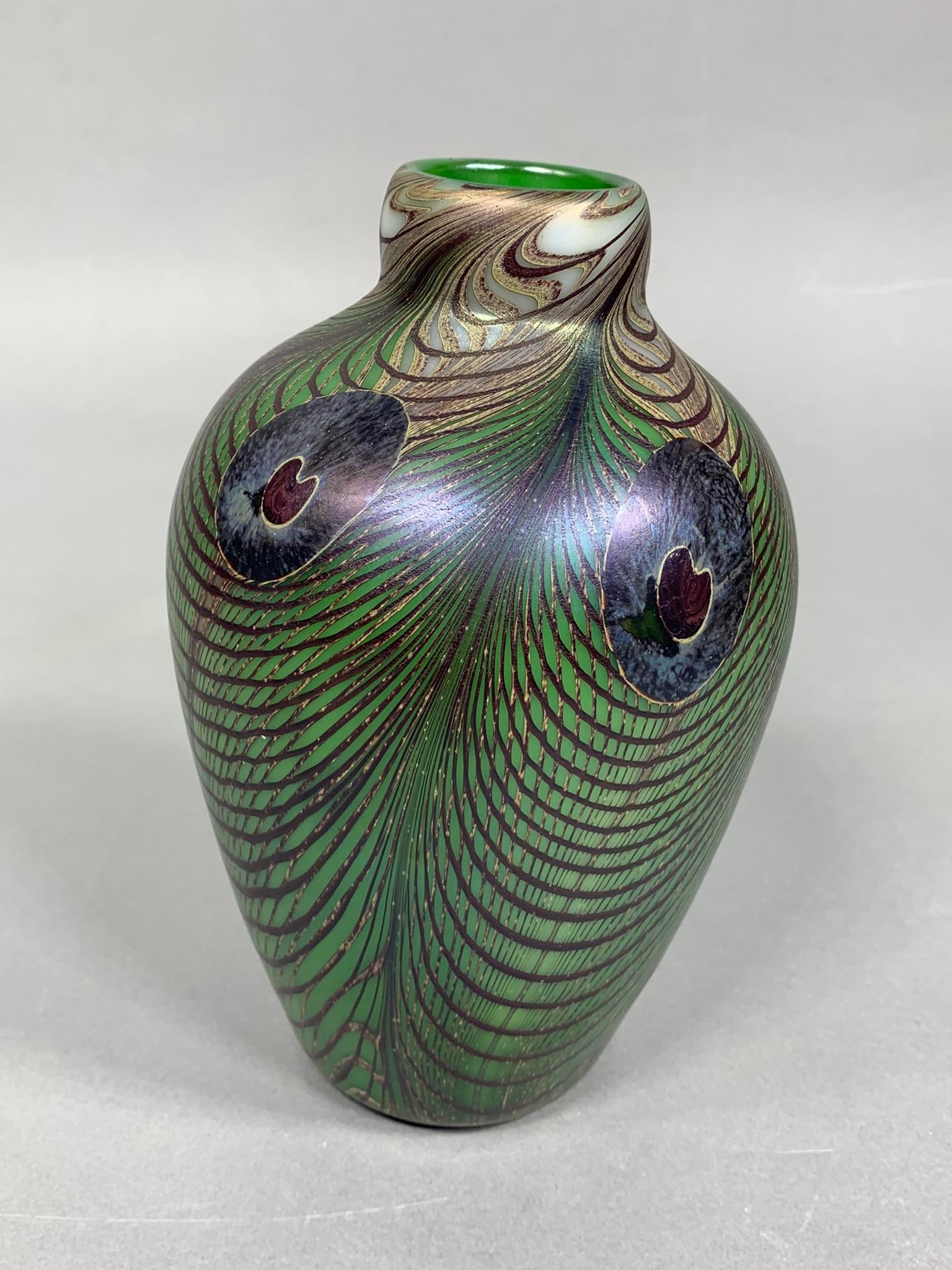 Peacock Feather Art Glass Vase Orient & Flume: Peacock Feather Art Glass Vase Orient & Flume. LiveAuctioneers gives us up to 20 photos, to see many more photos of most lots find this sale on Proxibid, where we can post up to 100 images. Orient & F