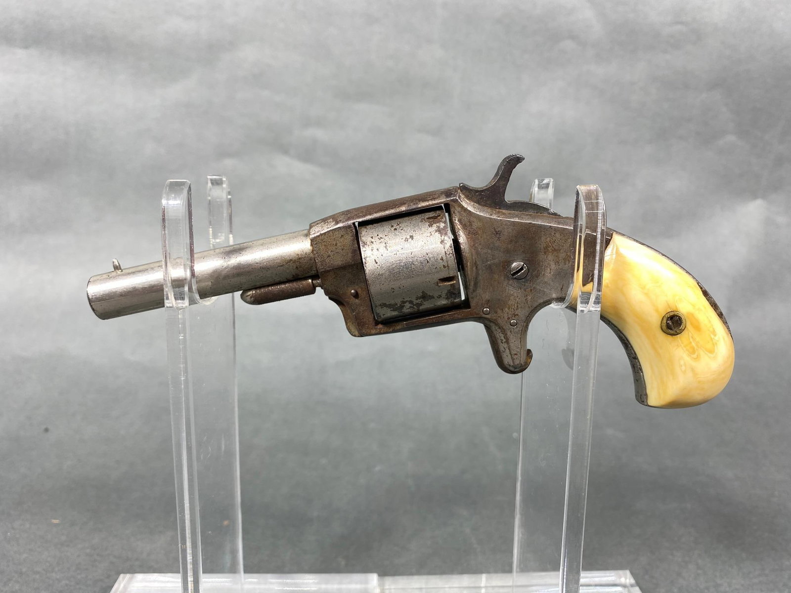 Antique Revolver Pistol "Defender" 30 Cal Colt Clone: Antique Revolver Pistol "Defender" 30 Cal Colt Clone. To see up to 100 photos of this lot, please find this sale on LiveAuctioneers. BRAND: Defender MODEL: Colt 1874 clone SERIAL: none CALIBER/GAUGE: 