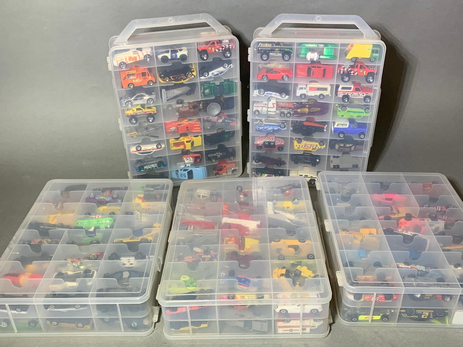 Five Double Sided Plastic Organizers Full of Collectible Cars: Five Double Sided Plastic Organizers Full of Collectible Cars. To see up to 100 photos of this lot, please find this sale on LiveAuctioneers. Hot Wheels, Matchbox & More. In-house shipping is availabl