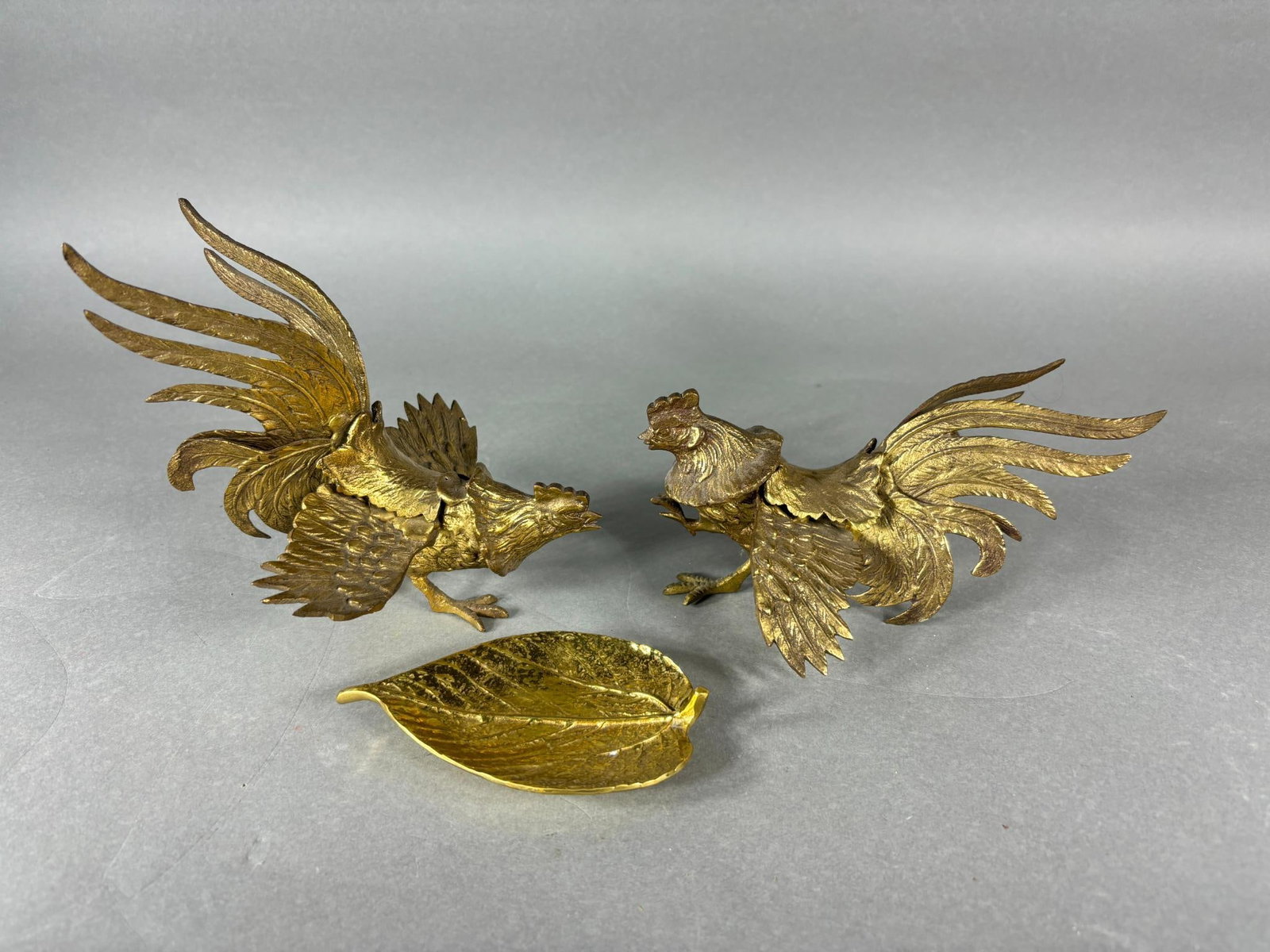3 Vintage Brass Pieces including 2 Chickens and 1 Leaf Ashtray: 3 Vintage Brass Pieces including 2 Chickens and 1 Leaf Ashtray. To see up to 100 photos of this lot, please find this sale on LiveAuctioneers. In-house shipping is available. Pickup is Friday, April 5