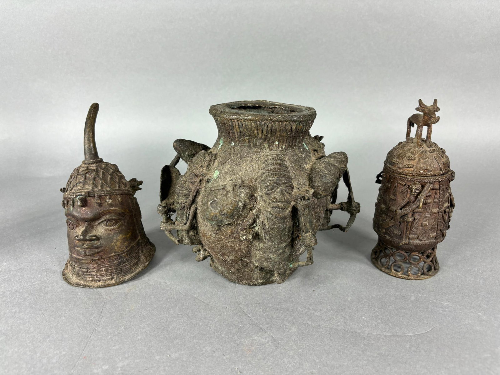 Group Lot of Unusual African Benin Bronze Containers: Group Lot of Unusual African Benin Bronze Containers. To see up to 100 photos of this lot, please find this sale on LiveAuctioneers. In-house shipping is available. Pickup is Friday, April 5th from 12
