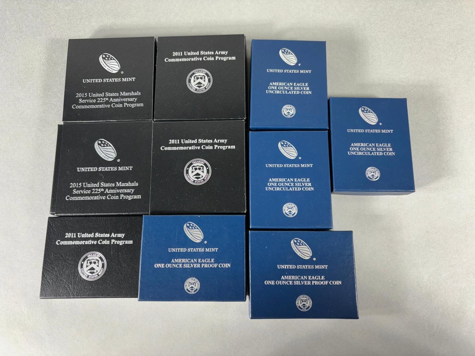 Group Lot of 10 US Mint Silver Dollar Coins: Group Lot of 10 US Mint Silver Dollar Coins. To see up to 100 photos of this lot, please find this sale on LiveAuctioneers. The US Mint puts a code, usually three digits, on nearly all of its boxes. I