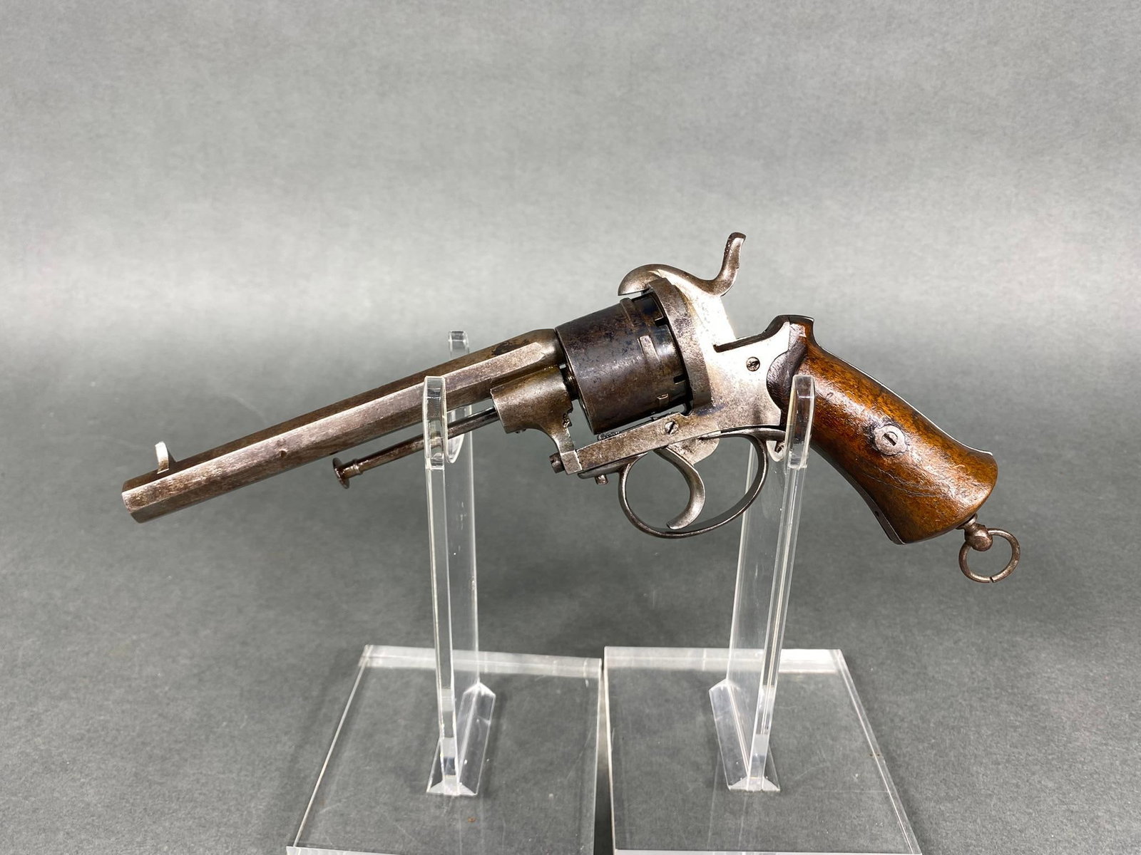 BELGIAN M1858 LEFAUCHEAX PINFIRE REVOLVER: BRAND: Lefaucheax MODEL: M1858 SERIAL: NSN CALIBER/GAUGE: 12 mm CONDITION: Bore is good. Action is inconsistent. SIZE: 5.25" bbl This firearm is Pre 1898 or percussion, so no background check is requi