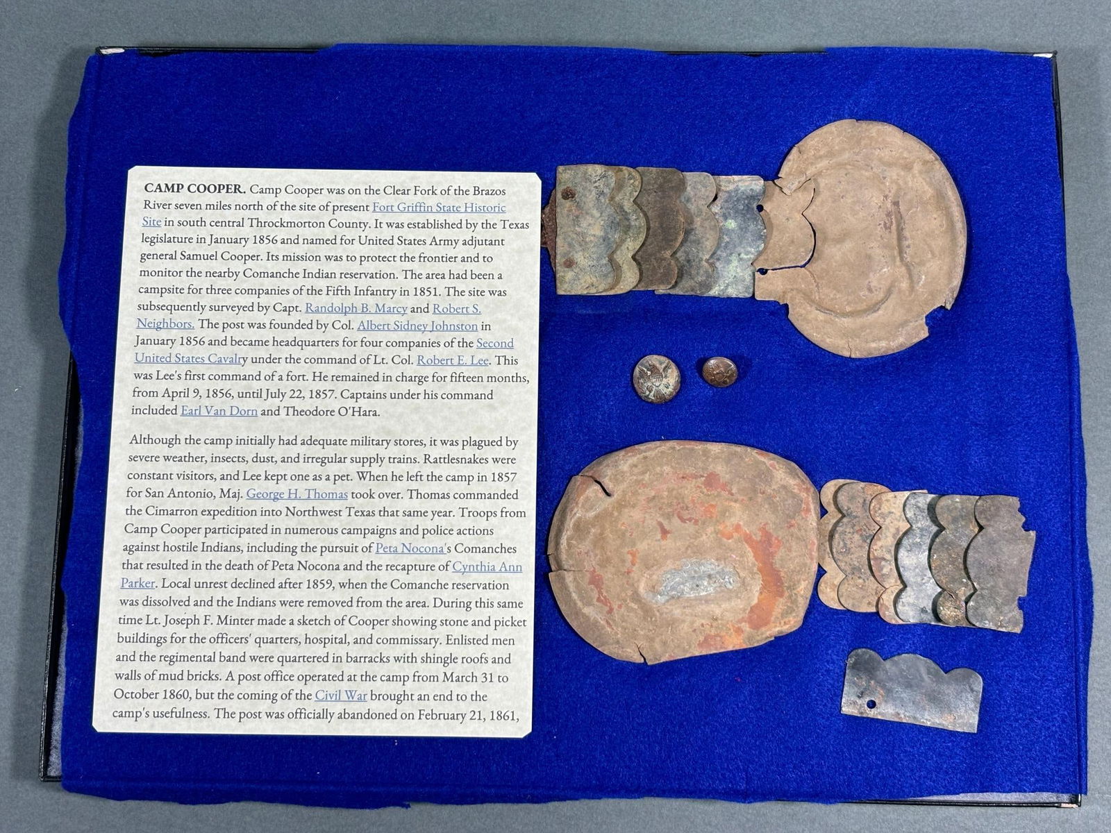 DUG CIVIL WAR ERA RELICS FROM CAMP COOPER, TEXAS: Dug relics from Camp Cooper included a set of shoulder scales and two Civil War Era infantry buttons. The buttons both have early pre - Civil War RMDC (raised mark depressed chanel) backmarks. Camp Co