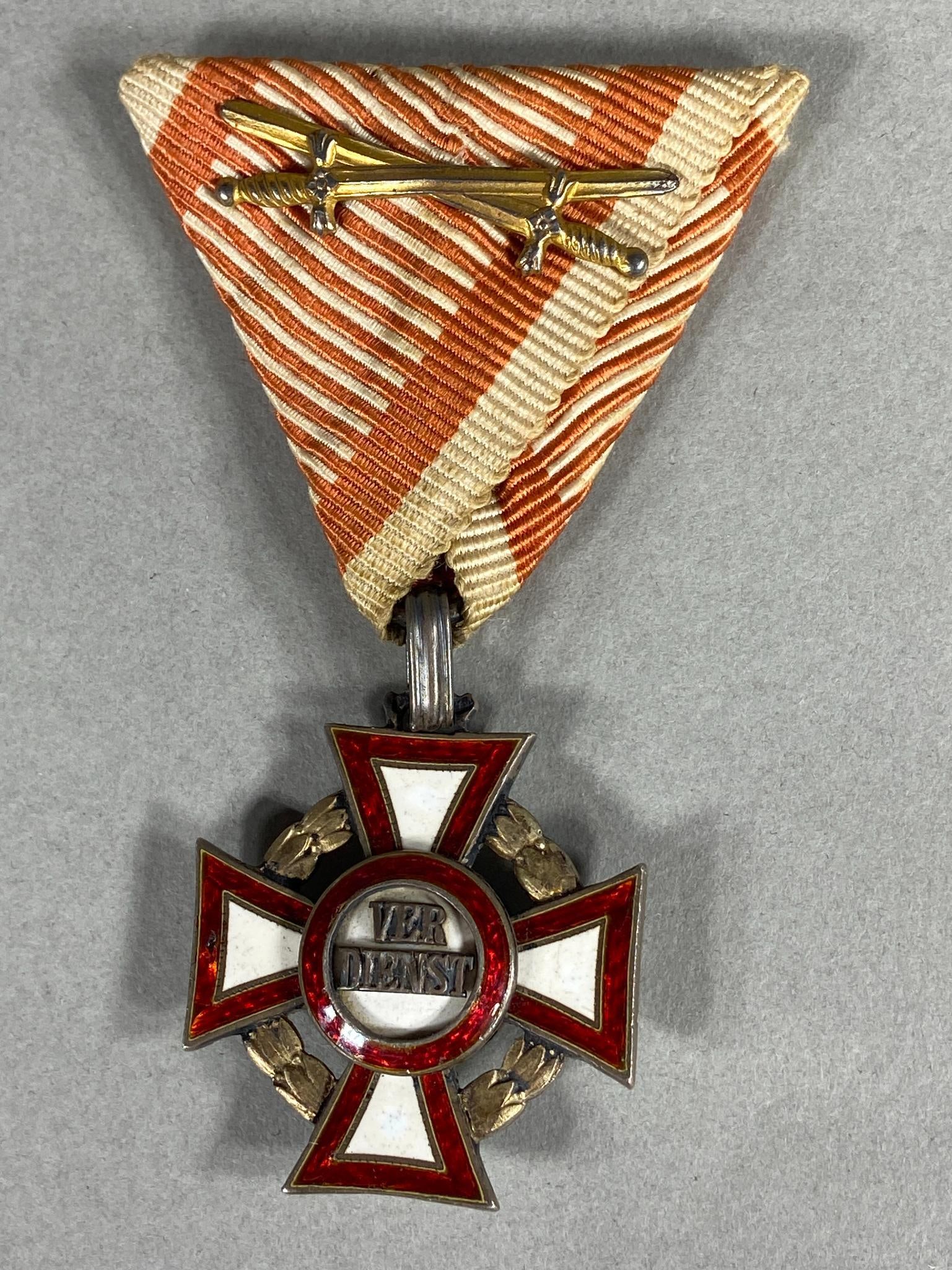 WWI AUSTRIA 3RD CLASS MILITARY MERIT CROSS SWORDS: World War One Austria - Hungary 3rd class military merit cross with swords. Overall very good condition with a tiny enamel chip on the left obverse horizontal arm of the cross. In-house shipping is av