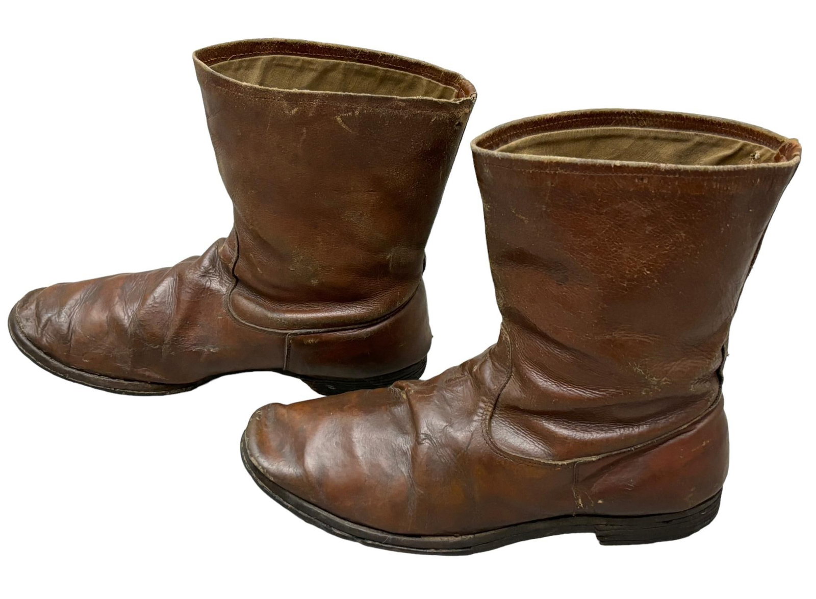 WWII IMP. JAPANESE ARMY AIR SERVICE HALF BOOTS: World War Two Japanese Army Service - Air Force pilot half boots consisting of three piece brown leather construction with a canvas inner lining. Overall 9" height including the 1" heel. The length of