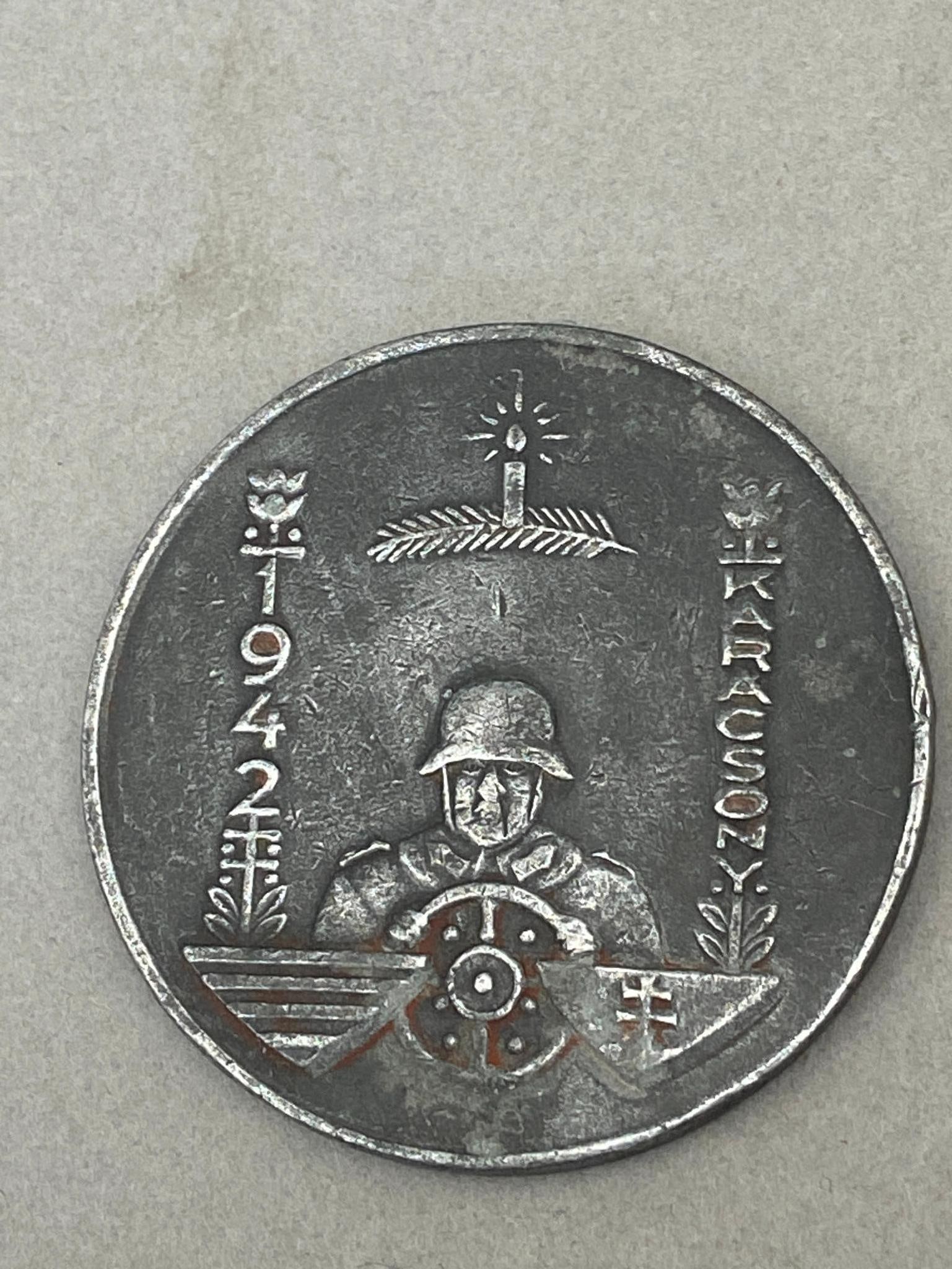 WW2 HUNGARIAN 1942 RUSSIAN FRONT CHRISTMAS MEDAL: World War Two Hungarian 1942 Russian Front Christmas medal with a dedication to the 101st Army Motor Vehicle regiment. Measures 40mm - 1.5748". Overall excellent condition. WWII In-house shipping is a