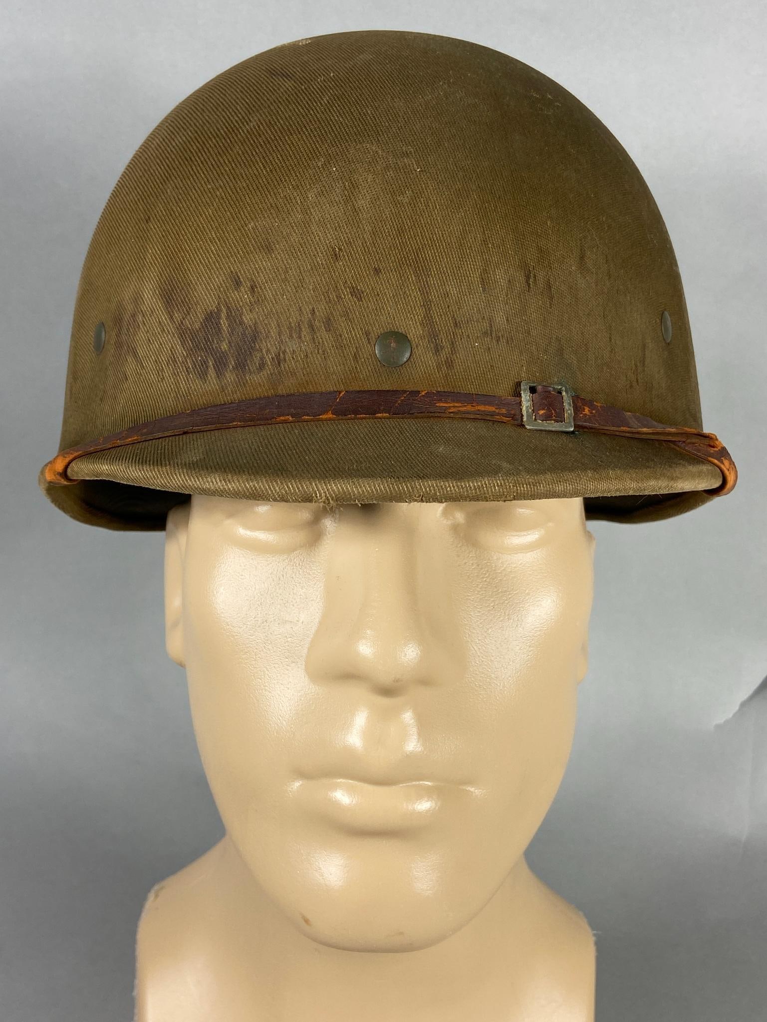 WWII US M1 HAWLEY HELMET LINER - IDED KIA 95TH ID 378TH REGIMENT: World War Two M 1 Hawley helmet liner (2nd pattern) with a stenciled service number and name, "33064306 - HOBINE", on the inside of the liner. His initials "W G H" are written in ink on the interior l