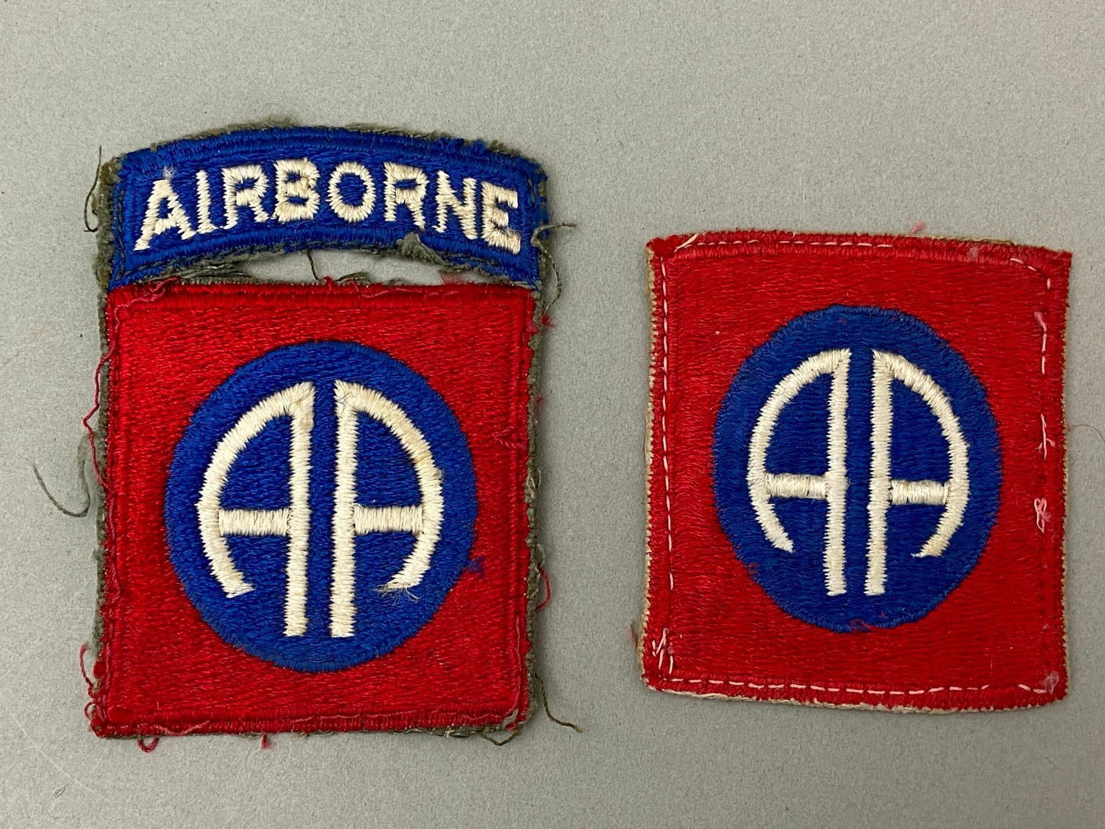 WWII US 82ND AIRBORNE PATCH LOT PARATROOPER: World War Two 82nd Airborne Paratrooper patches. Both are cut edge with one having a fixed tab. In-house shipping is available. Pickup is Monday, April 29th from 11 am to 3 pm in Carroll, Ohio 43112 o