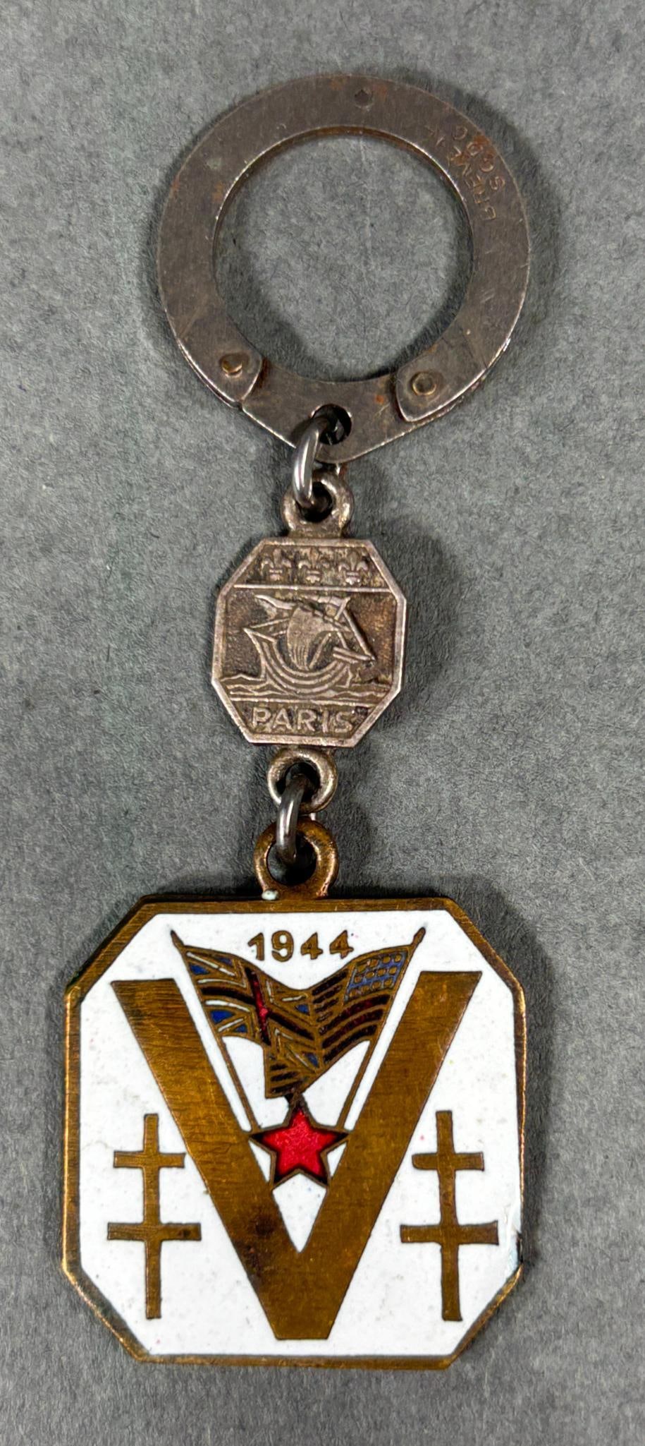 WWII FRENCH MADE "V FOR VICTORY" KEY CHAIN SGDG PATENT STAMP: World War Two French made keychain with vintage SGDG patent mark on both sides of the split ring. A small "Paris" medal is attached to the ring. The key chain fob is enamel and features the letter V f