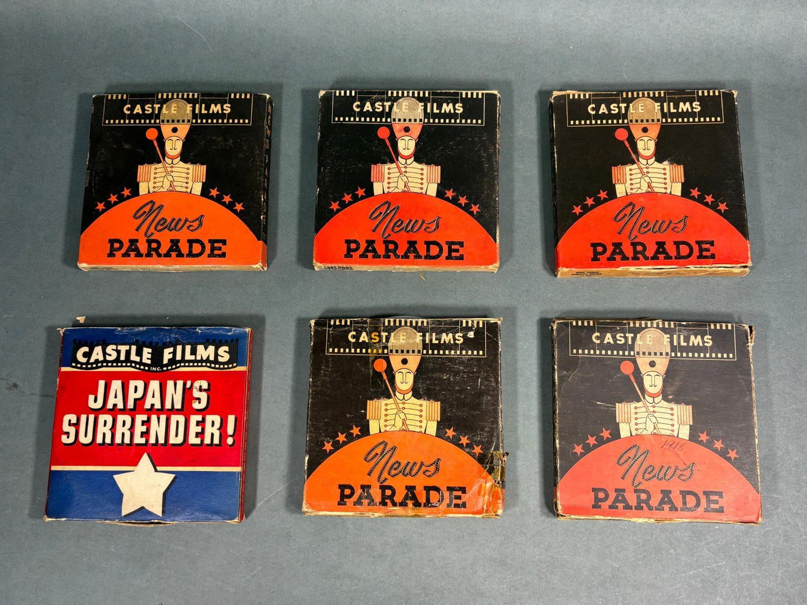 WWII 16MM CASTLE FILMS WAR NEWS LOT (6): World War Two 16mm Castle Films lot (6). The reels are housed in the original cardboard cases. The first 5 titles include - 161 Japan's Surrender!; 153 Invasion of Fortress Europe / Rome Falls to the