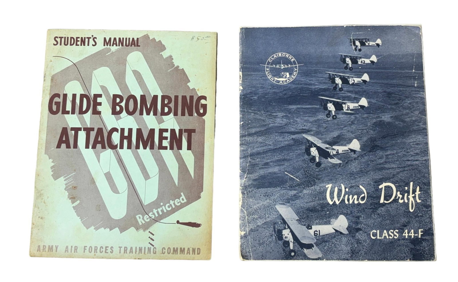 WW2 AAF RESTRICTED TRAINING MANUALS GLIDE BOMBING ATTACHMENT, WIND DRIFT, MISC. EPHEMERA: World War Two United States Army Air Force training manuals; Glide Bombing Attachment (restricted) and Wind Drift Class 44-F. Five wartime pieces of U.S. AAF ephemera are included. In-house shipping i