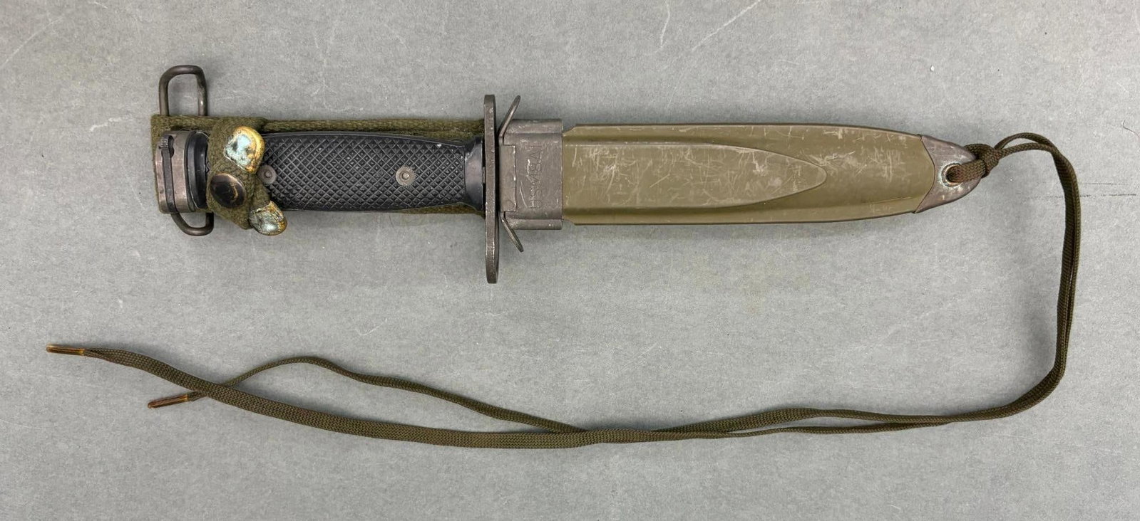 VIETNAM WAR M7 BAYONET BOC M8A1 SCABBARD: Vietnam War M-7 bayonet made by BOC (Bauer Ordnance Co.). BOC made the majority of the Vietnam War M7 bayonets. Marked M7 BOC on crossguard. M8A1 scabbard stamped P W H. Excellent untouched condition.
