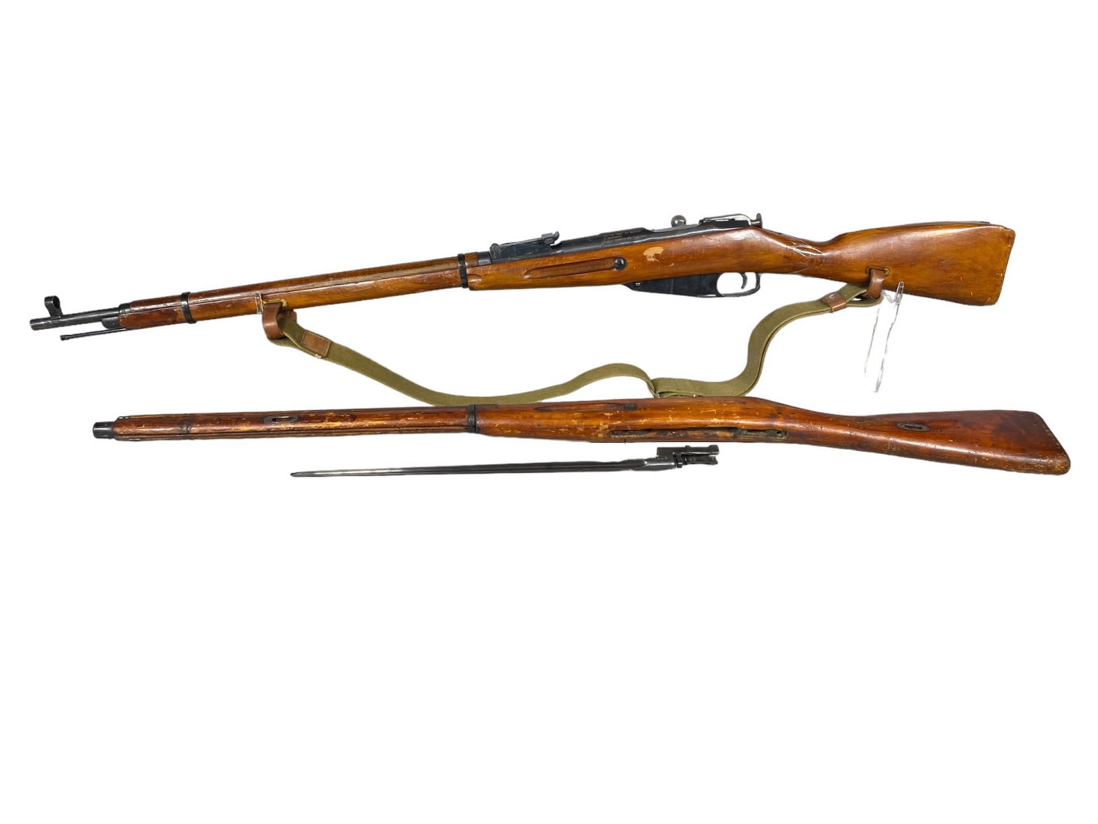 *Russian M91/30 Mosin Nagant Rifle w/Bayonet, Extra Stock: BRAND: Russian MODEL: M91/30 Mosin-Nagant SERIAL: 91304890934 CALIBER/GAUGE: 7.62x54R CONDITION: Action good, bore good. Stock has a crack but there is a spare stock. SIZE: 29" barrel. NOTES: Cracked 