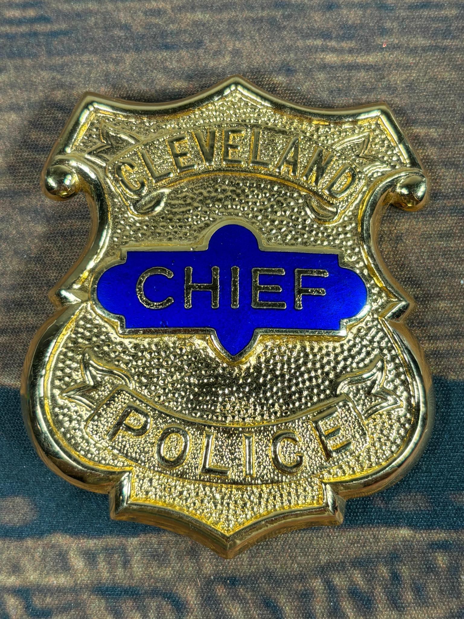 Rare Cleveland Chief of Police Obsolete Badge: 2.25" x 2.75". In-house shipping is available. Pickup is Tuesday, June 4th from 1 pm to 7 pm and Wednesday, June 5 from 11 am to 3 pm at our offices in Carroll, OH 43112 or we will provide in-house sh