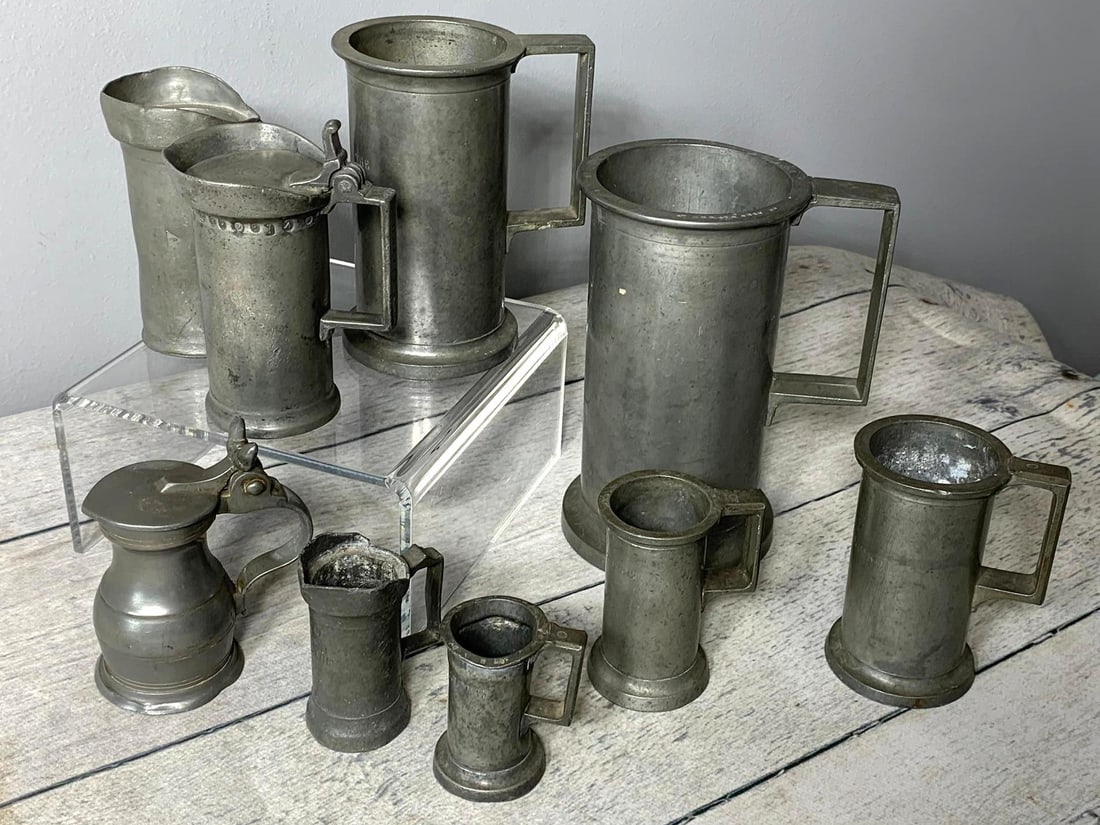 Large Group of Antique Early Pewter Measures Early to Late 19th Century: Most are signed and date stamped. See photos for condition some dents and cracks among the items. In-house shipping is available. Pickup is Tuesday, June 4th from 1 pm to 7 pm and Wednesday, June 5 fr