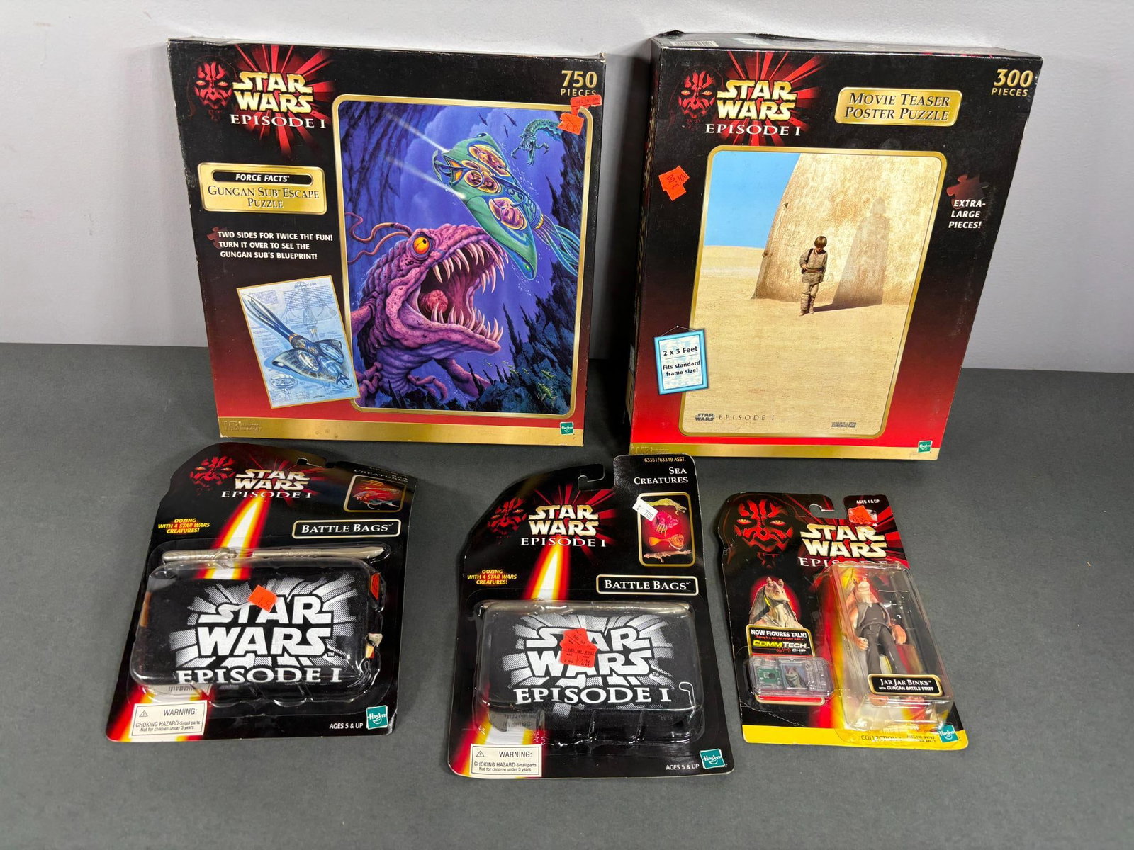 Group of Star Wars Puzzles and Toys: Unknown if all puzzle pieces exist. In-house shipping is available. Pickup is Tuesday, June 4th from 1 pm to 7 pm and Wednesday, June 5 from 11 am to 3 pm at our offices in Carroll, OH 43112 or we wil