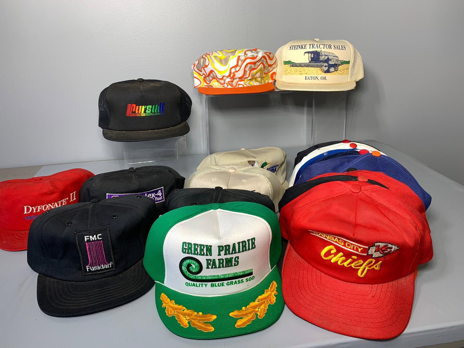 Group of Sports Related Hats and Others: In-house shipping is available. Pickup is Tuesday, June 4th from 1 pm to 7 pm and Wednesday, June 5 from 11 am to 3 pm at our offices in Carroll, OH 43112 or we will provide in-house shipping for this