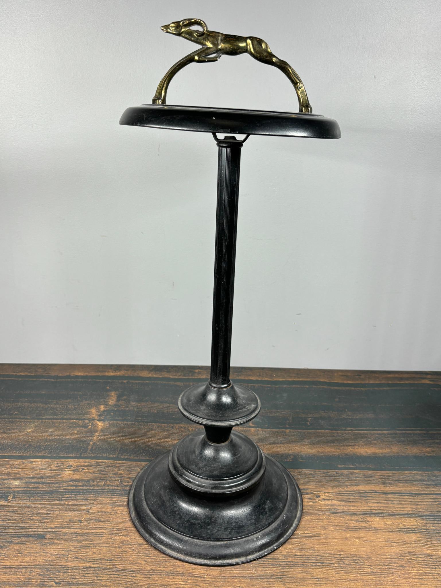 Vintage Art Deco Style Ashtray with Leaping Impala: 27.5" high. Base is slightly loose. In-house shipping is available. Pickup is Tuesday, June 4th from 1 pm to 7 pm and Wednesday, June 5 from 11 am to 3 pm at our offices in Carroll, OH 43112 or we wil