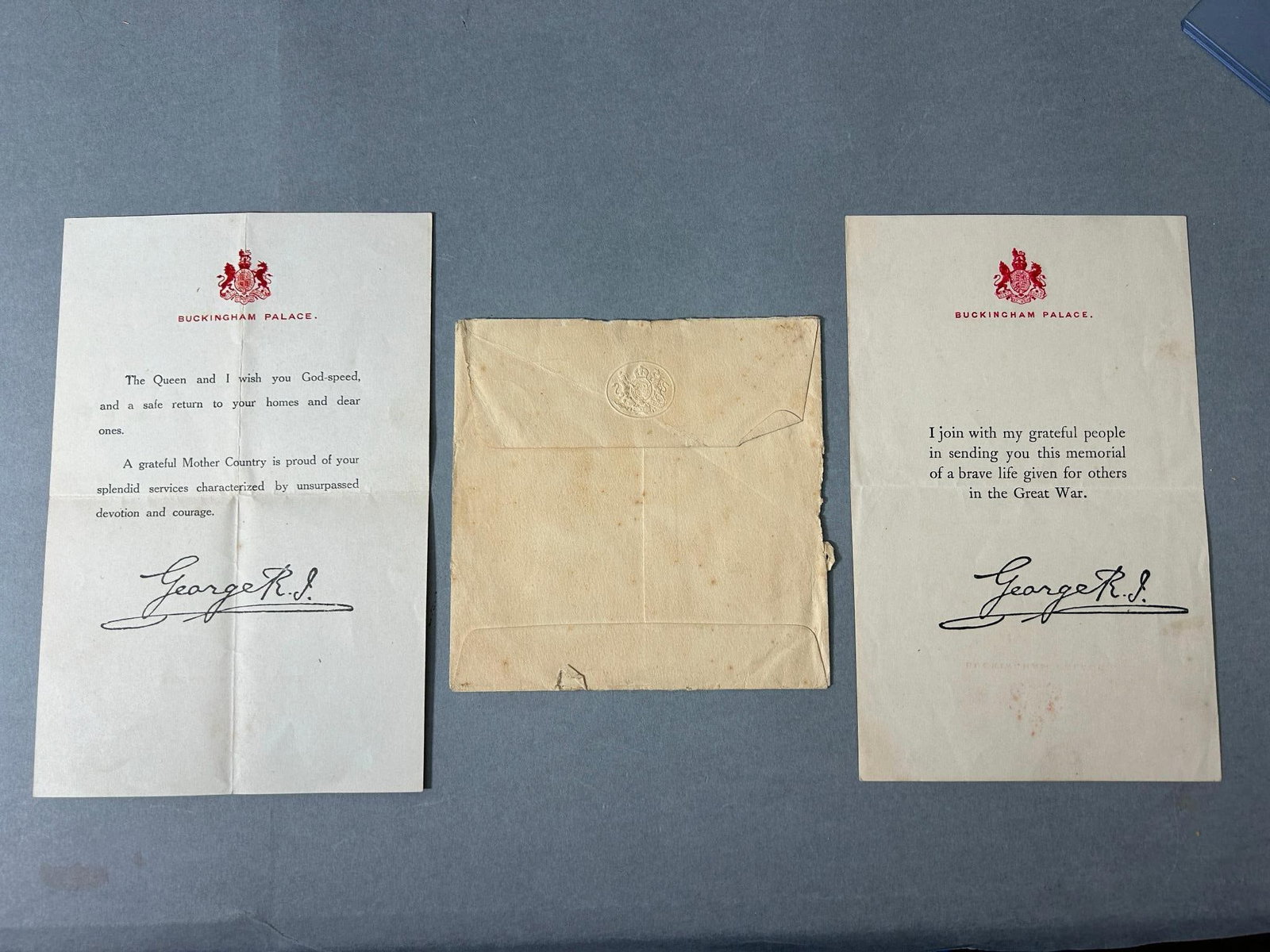 WWI British King George V Printed Letter Lot - Death Penny Letter & Demobilization Letter: World War One British printed letters sent from Buckingham Palace / King George V. 1. Demobilization letter sent to troops returning home.The text reads, "The Queen and I wish you God-speed, and a saf