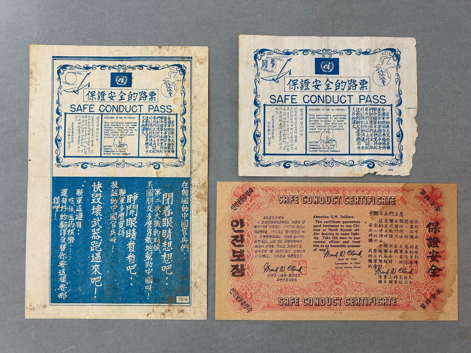 Korean War United Nations Safe Conduct Pass Lot for Chinese & North Korean Soldiers: Korean War U. N. safe safe conduct leaflet propaganda lot offering safe passage / conduct to Chinese or North Korean troops who desired to ceased fighting. These leaflets are printed in Chinese, Korea