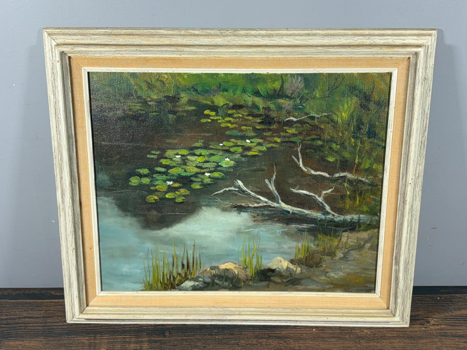 Vintage Framed Landscape Painting of Pond and Lily Pads Signed by Elliott: In-house shipping is available. Pickup is Friday, August 9th from 11 am to 7 pm at our offices in Carroll, OH 43112 or we will provide in-house shipping for this item. Once packed up we will send you 