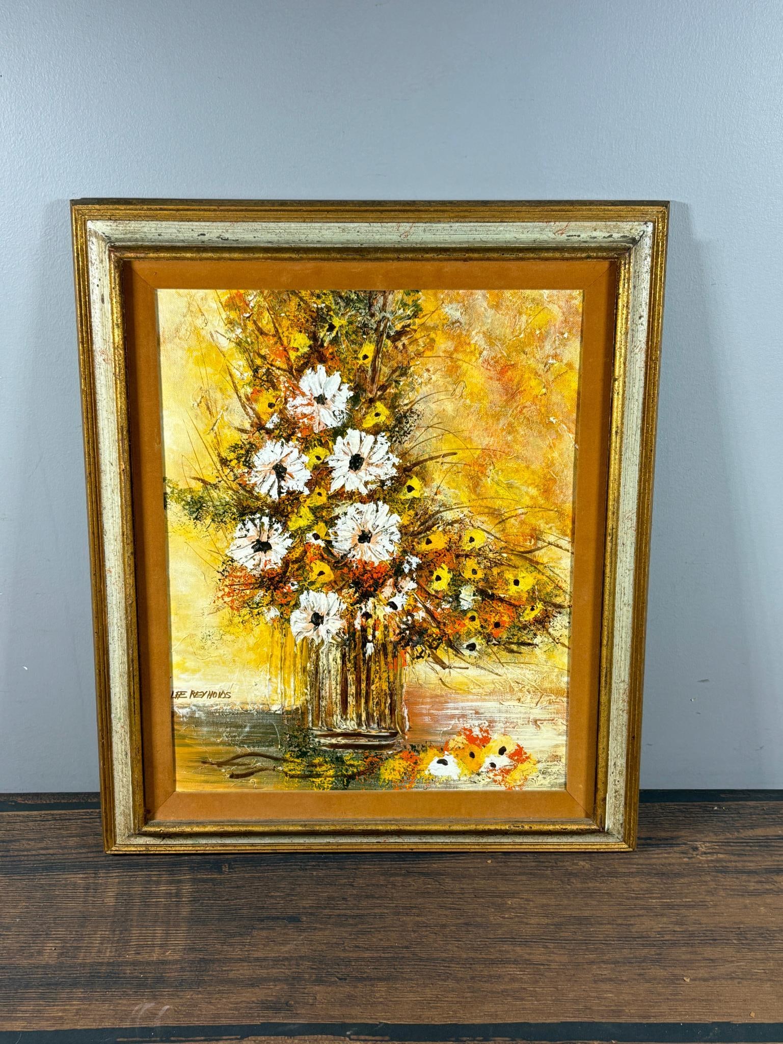 Vintage Oil on Canvas Still Life Painting of Flowers By Lee Reynolds: 25"W x 21" H. In-house shipping is available. Pickup is Friday, August 9th from 11 am to 7 pm at our offices in Carroll, OH 43112 or we will provide in-house shipping for this item. Once packed up we
