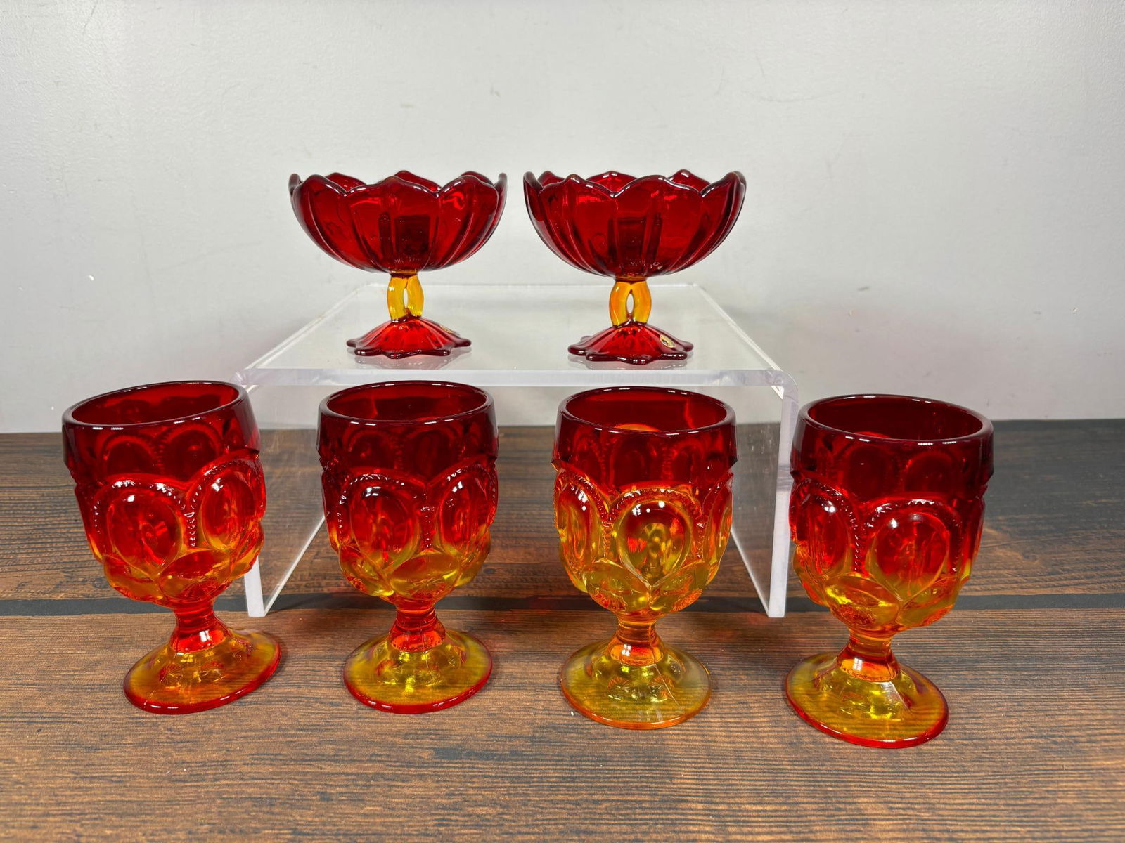 Vintage Westmoreland Glass Compotes and L.E. Smith Glass Goblets: All Amberina Color. In-house shipping is available. Pickup is Friday, August 9th from 11 am to 7 pm at our offices in Carroll, OH 43112 or we will provide in-house shipping for this item. Once packed