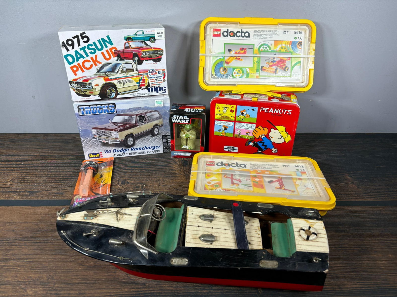 Lot of Vintage Toys; Lego, Motorboat, Plastic Model Kits, Peanuts Lunchbox, Star Wars, Pez: Model Kits are sealed. In-house shipping is available. Pickup is Friday, August 9th from 11 am to 7 pm at our offices in Carroll, OH 43112 or we will provide in-house shipping for this item. Once pack
