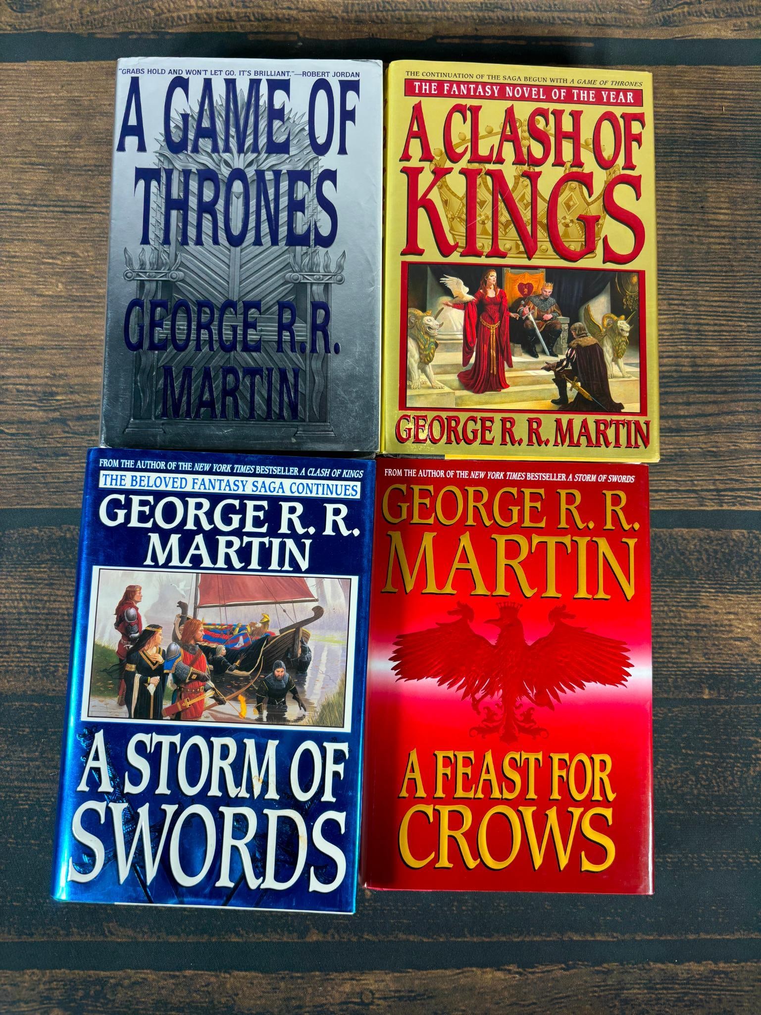 Signed - George RR Martin Song of Ice and Fire Signed First Edition Book Set: Each is a signed first edition including A Game of Thrones. A Game of Thrones has some wrinkles to the cover but overall good. Each signed by George R.R. Martin. In-house shipping is available. Pickup