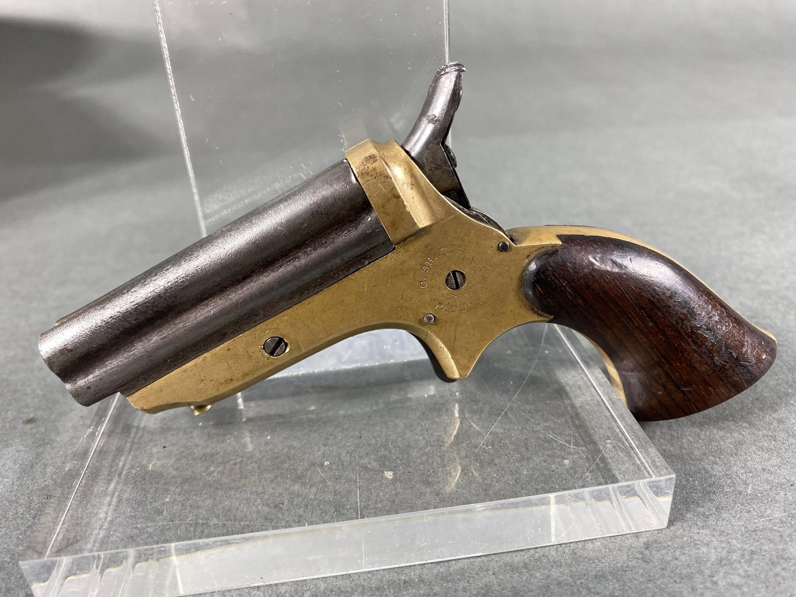 C. Sharps Model 1C Pepperbox Pistol #'s Match NOFFL: MFG/IMPORTER: C. Sharps MODEL: 1C SERIAL: 24020 CALIBER/GAUGE: 22 short CONDITION: Action good, bore good. Barrel slides off - doesn't catch when released. SIZE: 2 5/8" bbls. NOTES: Numbers match. In