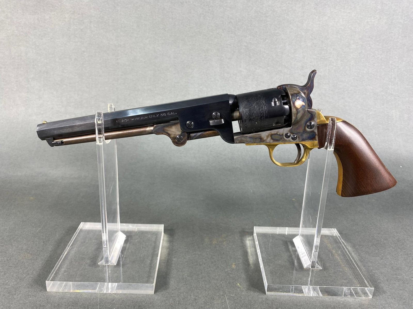 Pietta Italy Colt 1861 Navy Black Powder Revolver 36 Cal NOFFL: MFG/IMPORTER: Pietta MODEL: Colt 61 Navy SERIAL: 363935 CALIBER/GAUGE: 36 CONDITION: Action good, bore good. SIZE: 8" bbl. NOTES: With plastic case. In house shipping available. This item is black pow
