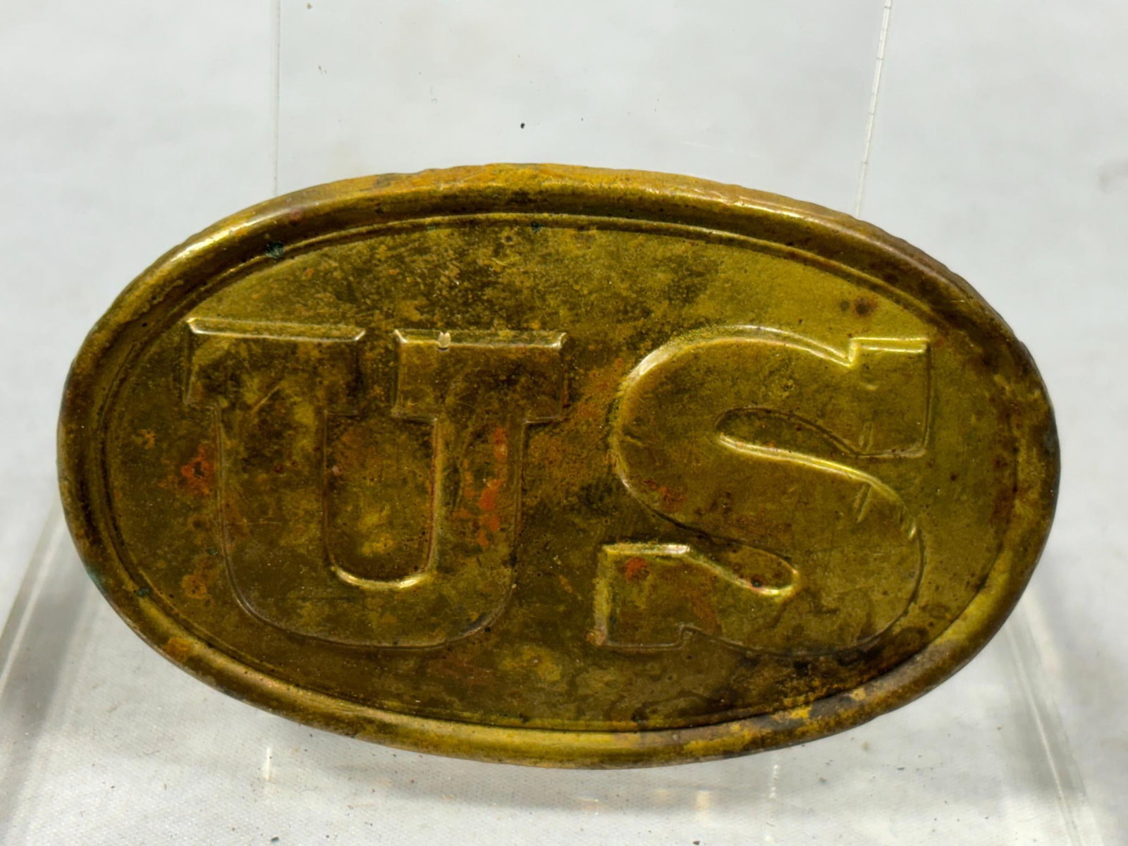 Civil War Union U.S. Cartridge Box Plate: Civil War cartridge box plate. Both attachment loops are present with some rust. This plate is lead filled and is at the correct shallow level unlike so many of the fakes/modern reproductions. In-hous