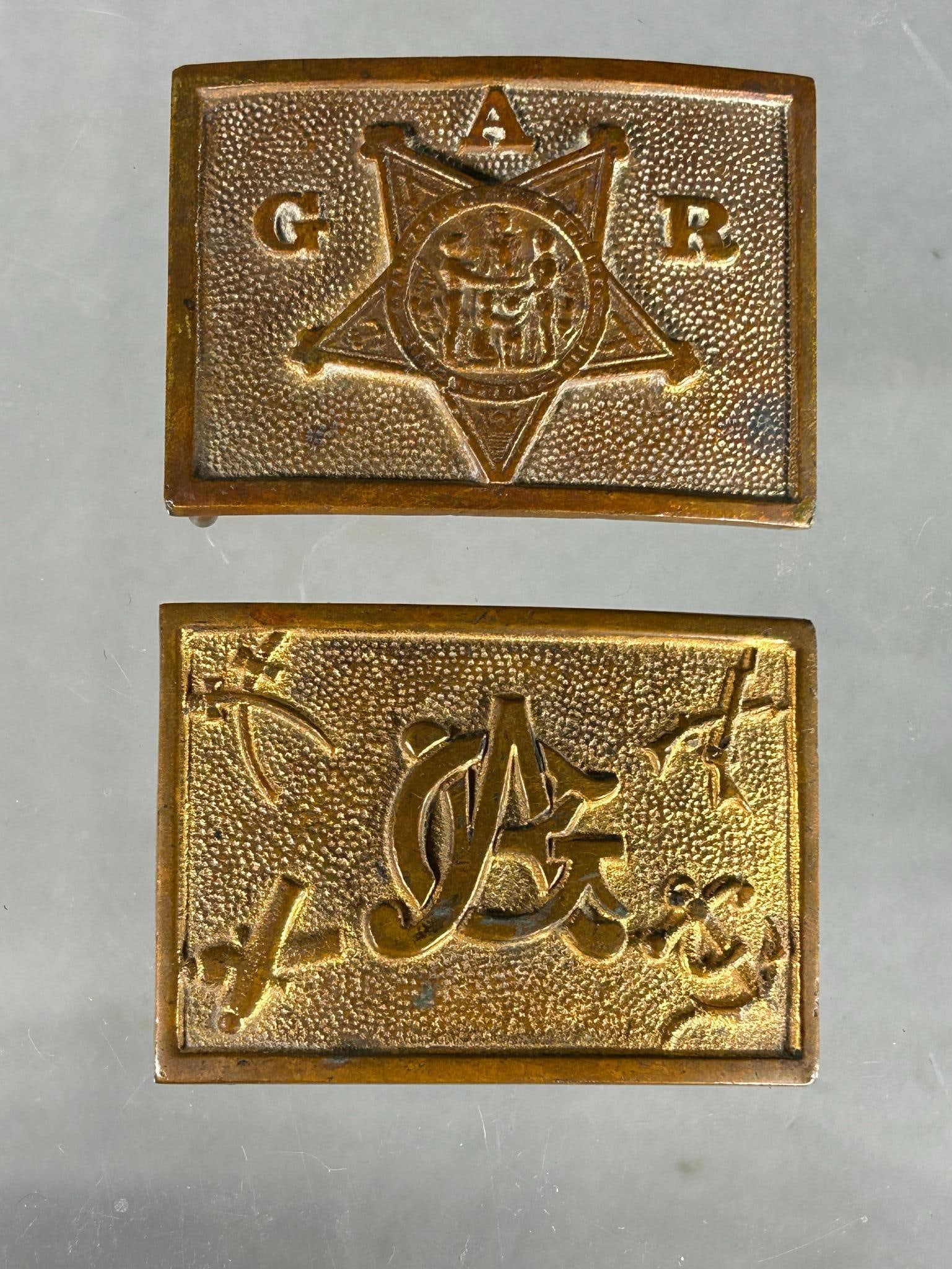 Civil War G.A.R. Belt Buckle Lot: Two Grand Army of the Republic belt buckles circa 1870s - 1880s. Each buckle measures 2.75" x 2". Both are made of brass. Excellent condition. In-house shipping is available. Open pickup is Tuesday, O