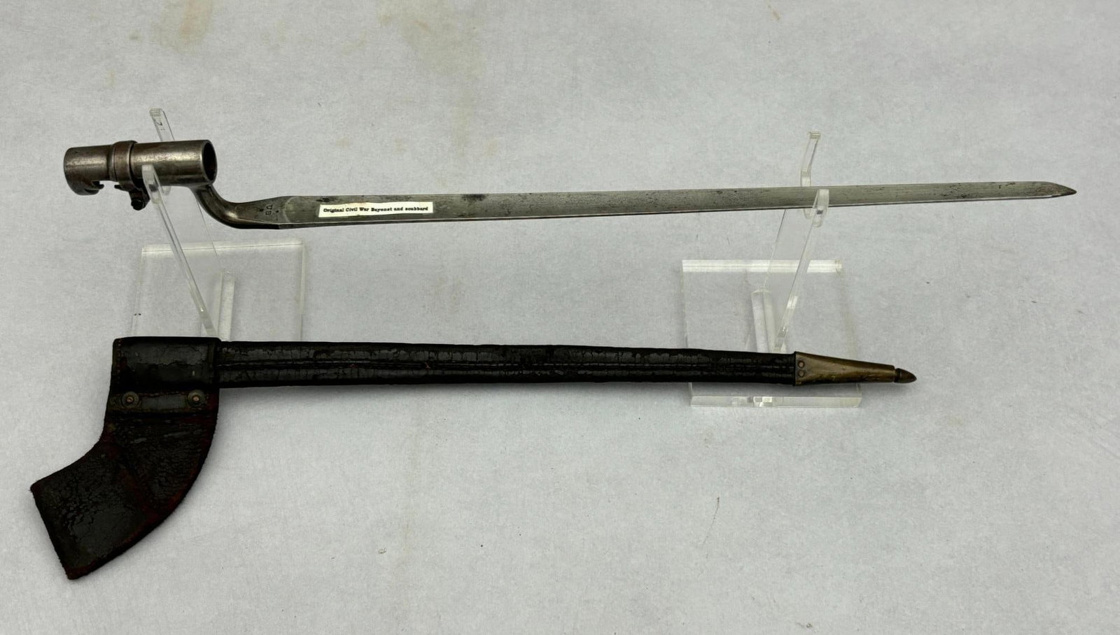Civil War M1855 U.S. Bayonet & M1859 Two Rivet Scabbard with Sewn Frog: Civil War M 1855 U.S. marked bayonet with an M 1859 two rivet scabbard and sewn on frog. The bayonet is stamped U.S. above a small "s". Overall length is 21" with an 18" blade. The accompanying scabba